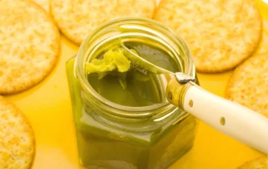 Step-by-step process showing how to make cannabutter at home with decarboxylated cannabis and melted butter