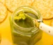 Step-by-step process showing how to make cannabutter at home with decarboxylated cannabis and melted butter